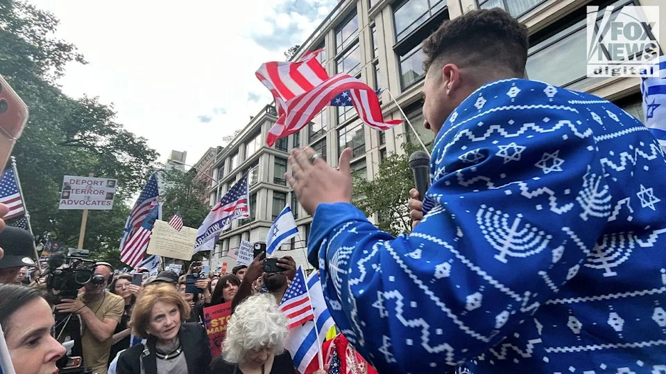 Zach Sage Fox speaks to protest crowd