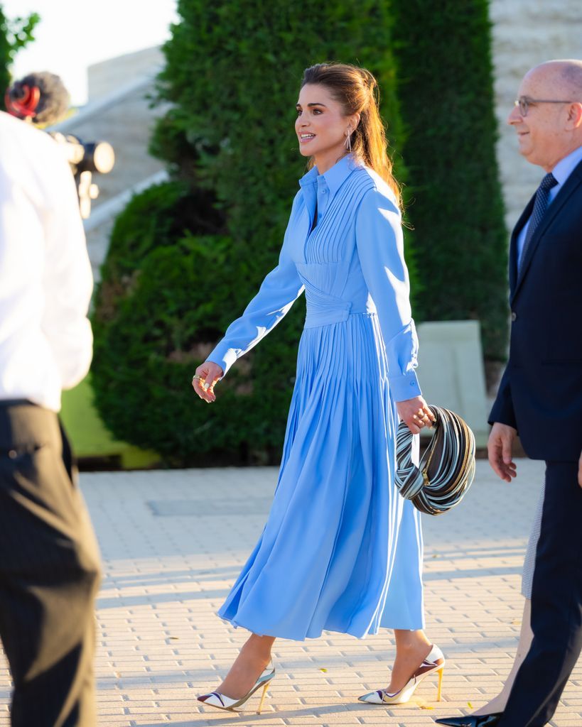 Queen Rania Confirms Blue Is Her Favorite Color With an Elegant Pleated Dress and Exclusive 16 Year Old Vintage Shoes