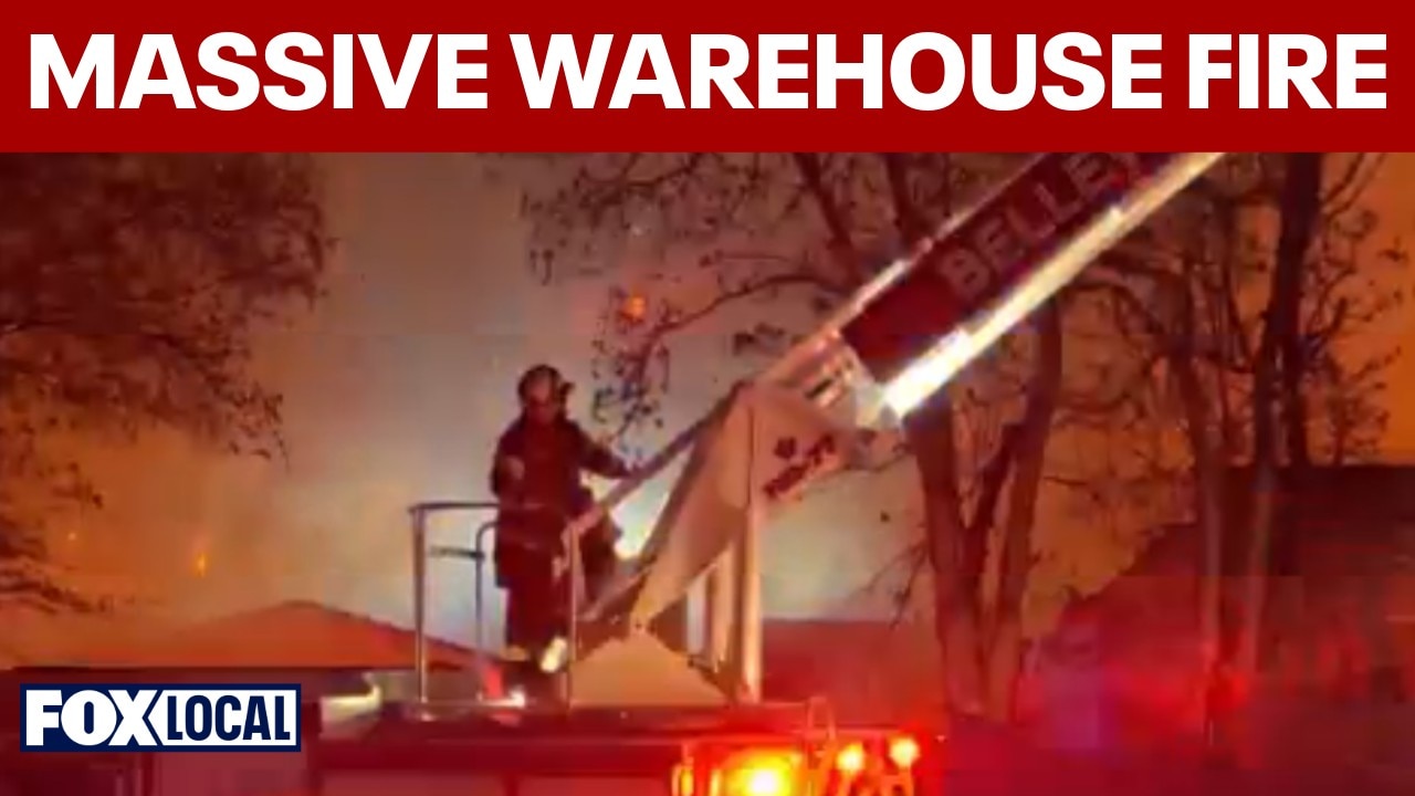 Massive warehouse fire in Belleville burns for hours, crews battle flames