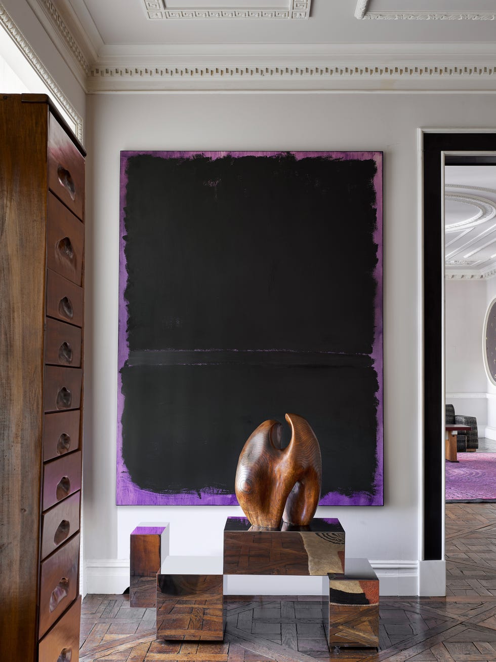 Modern interior featuring abstract art and sculptural decor.