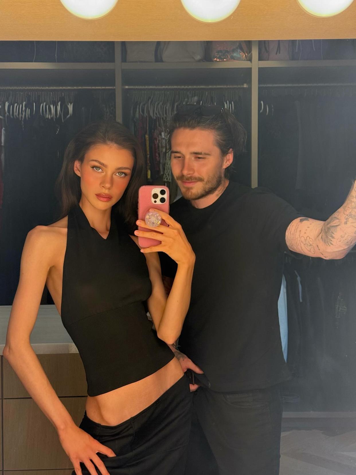 Last month, Brooklyn (seen above in a mirror selfie with his wife) also snubbed his mom Victoria’s birthday. nicolaannepeltzbeckham/Instagram