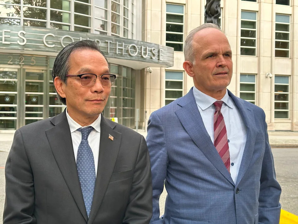 John Carman, Lu's lawyer, (right) says that he will appeal the verdict (AP)