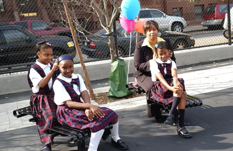 P.S. 242 students using hair-braiding station at their student-designed community playground in Manhattan. (Trust for Public Land)