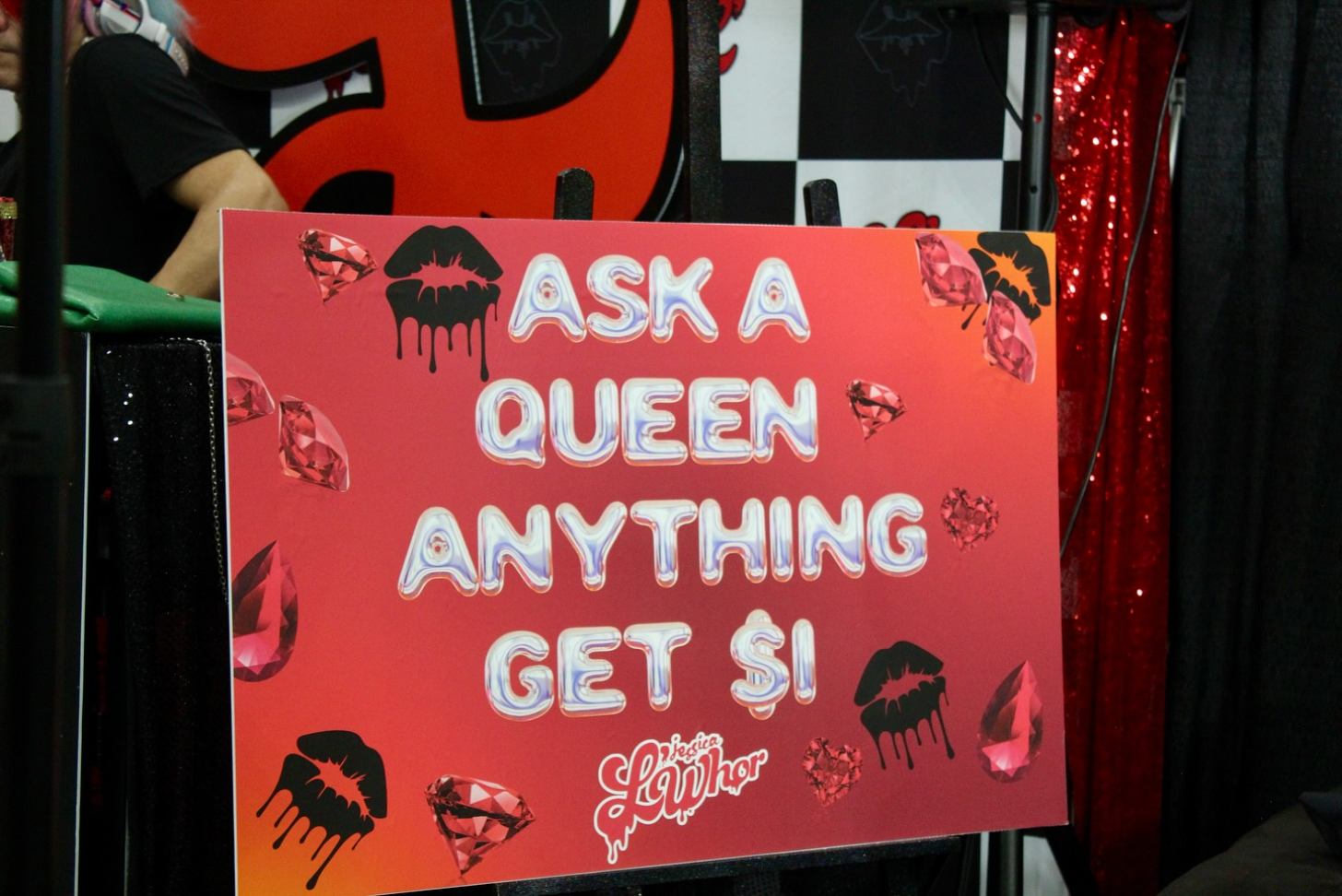 A red poster reads: "Ask a queen anything, get $1!" 