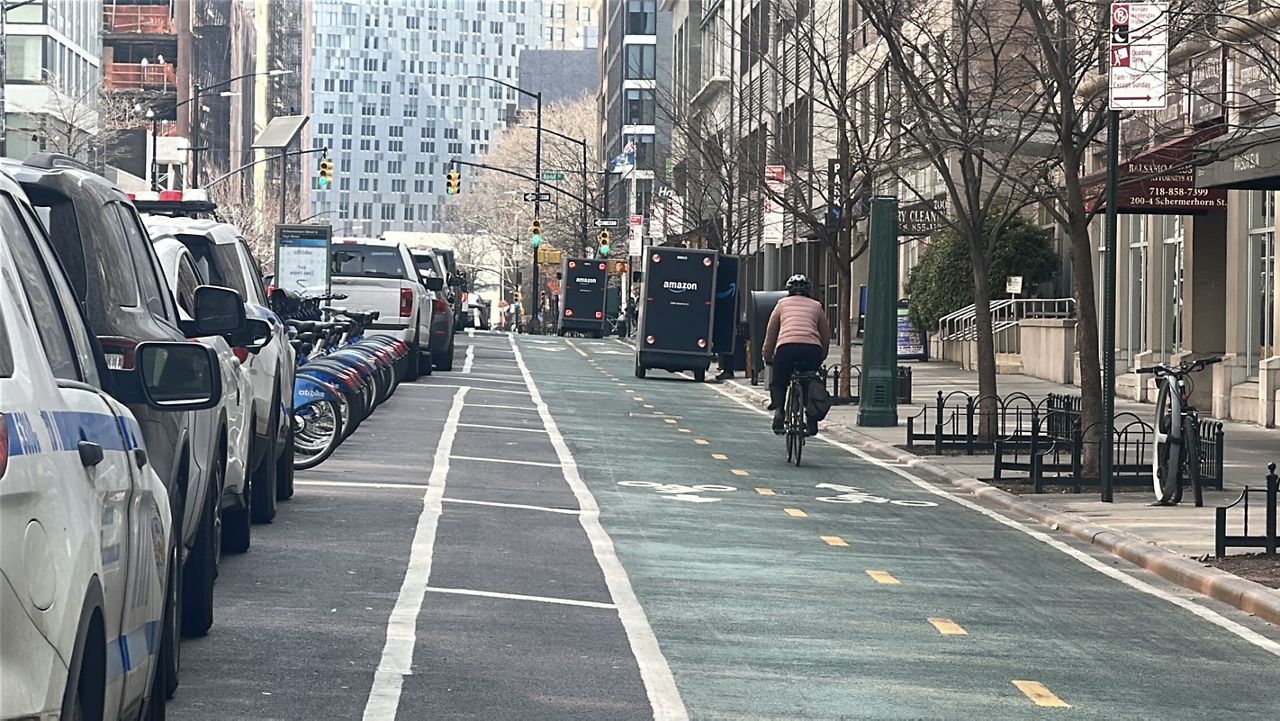 New York City plans to widen the protected bike lane on Sixth Avenue from 6 feet to 10 feet. (Spectrum News NY1/Samantha Liebman)