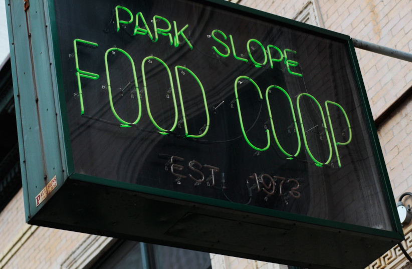 A sign for the Park Slope Food Coop on September 17, 2010 in the Brooklyn borough of New York City. The Park Slope Food Coop, where shoppers must work periodic shifts at the grocery store in order to buy there.