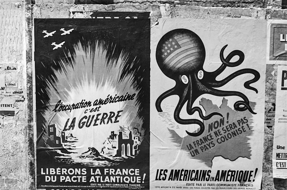 Two French Communist Party posters side by side: one showing bombers over a ruined city, the other a Stars-and-Stripes octopus strangling the map of France.