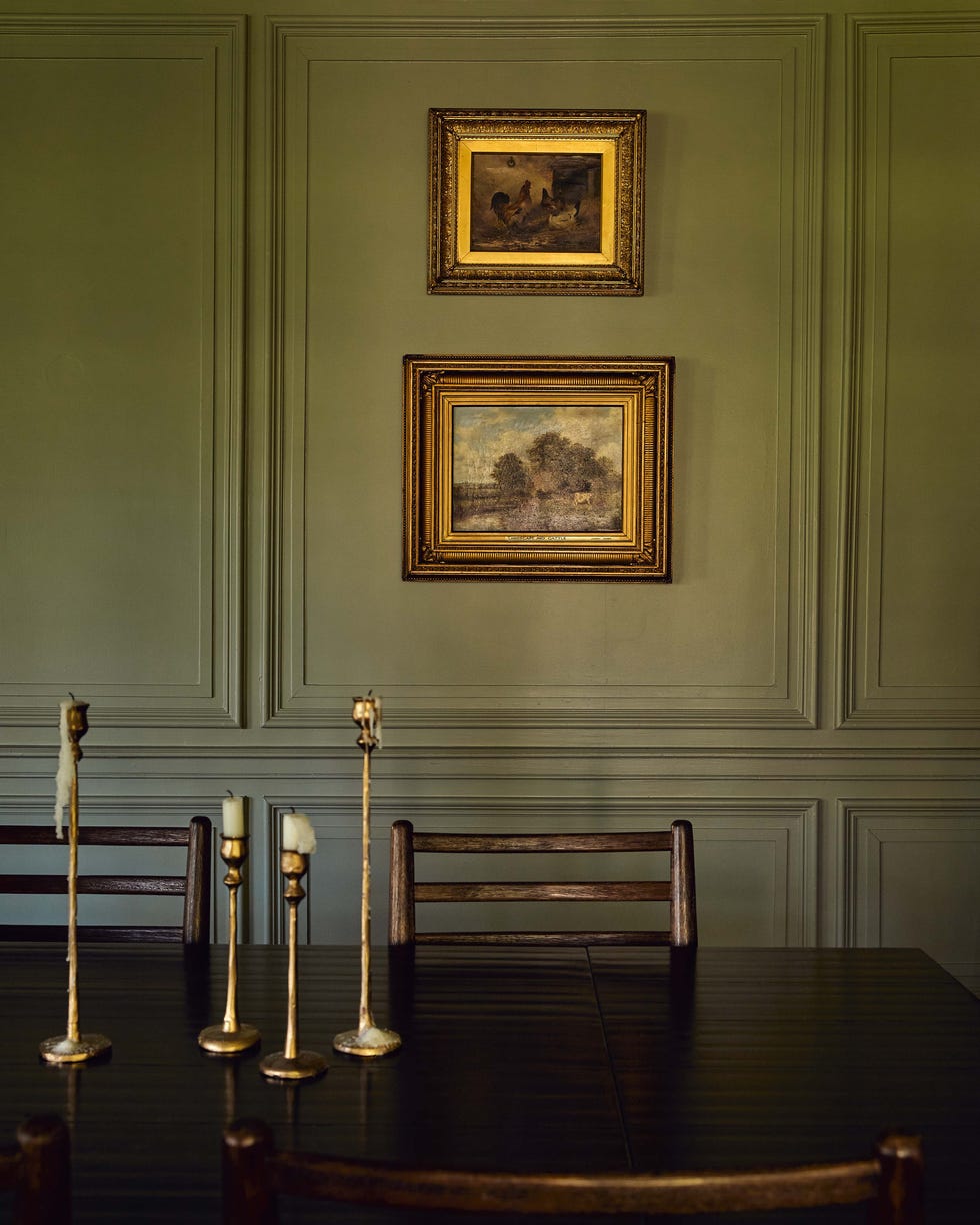 Dining area with wall art and candle holders