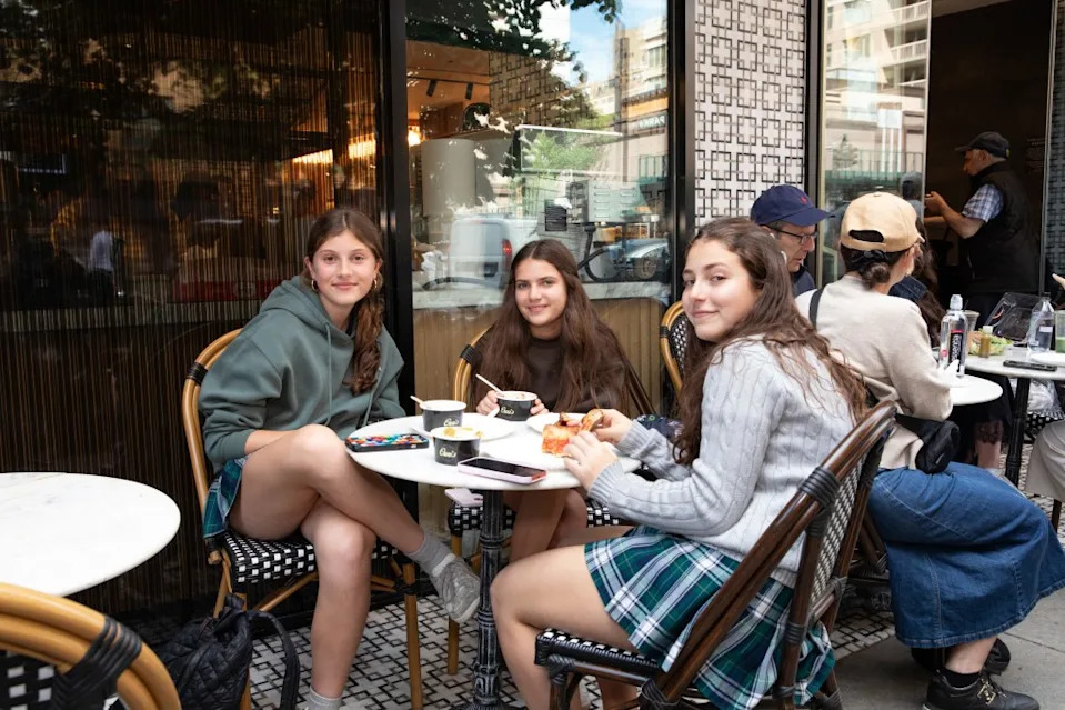 Local Upper East Side teens enjoy laughs and snacks on their school lunch break. Olga Ginzburg for the N.Y. Post