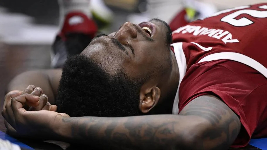 Arkansas Razorbacks forward Billy Richmond III (24) reacts after hitting the court. Credit: Eakin Howard-Imagn Images