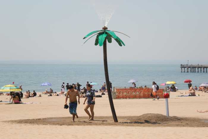beachgoers spray shower coney island