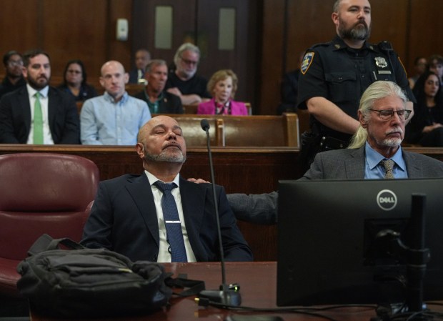 Harry Ruiz, left, reacts in court after a Manhattan judge vacated his decades-old conviction for the murder of Emmanuel Felix on Monday, April 27, 2026. (Dean Moses / amNY / Pool)