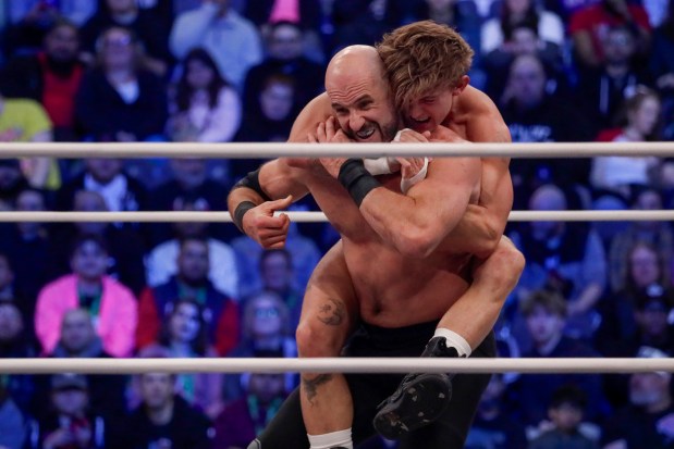 HOOK latches onto the back of Claudio Castagnoli in the ring and under the roof of Louis Armstrong Stadium in Flushing NY on May 24, 2026 during a live televised broadcast of AEW Pay Per View Double or Nothing. (Photo by Andrew Schwartz)