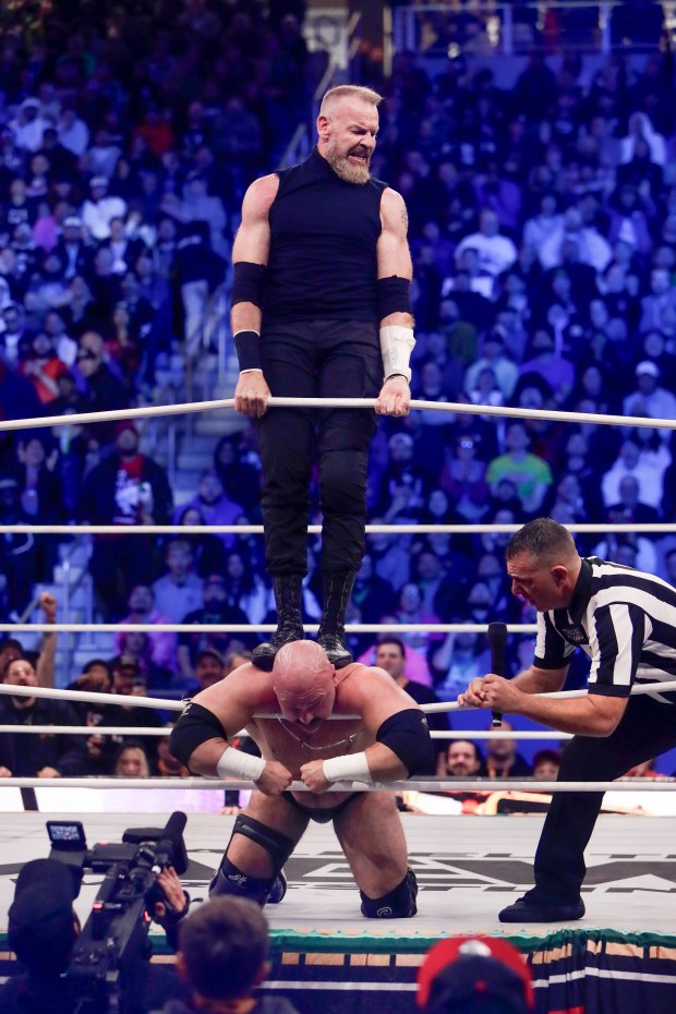 Christian Cage uses the ropes while fighting a member of FTR in the ring and under the roof of Louis Armstrong Stadium in Flushing NY on May 24, 2026 during a live televised broadcast of AEW Pay Per View Double or Nothing. (Photo by Andrew Schwartz)