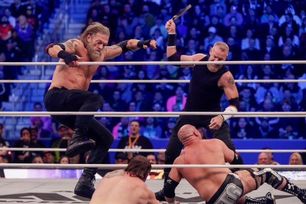 Christian Cage and Adam Copeland fight FTR in the ring and under the roof of Louis Armstrong Stadium in Flushing NY on May 24, 2026 during a live televised broadcast of AEW Pay Per View Double or Nothing. (Photo by Andrew Schwartz)