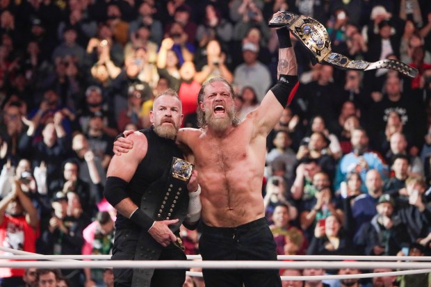 Christian Cage and Adam Copeland celebrate winning the AEW World Tag Team Championship under the roof of Louis Armstrong Stadium in Flushing NY on May 24, 2026 during a live televised broadcast of AEW Pay Per View Double or Nothing.(Photo by Andrew Schwartz)
