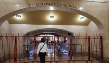 A passenger looks at a closed off entrance to the Long Island Rail Road at Grand Central station, Saturday, May 16, 2026. (AP Photo/Heather Khalifa)