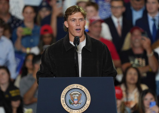NFL quarterback Jaxson Dart, with the New York Giants, introduces President Donald Trump during a Fighting For American Workers event, Friday, May 22, 2026, in Suffern, N.Y. (AP Photo/Ryan Murphy)