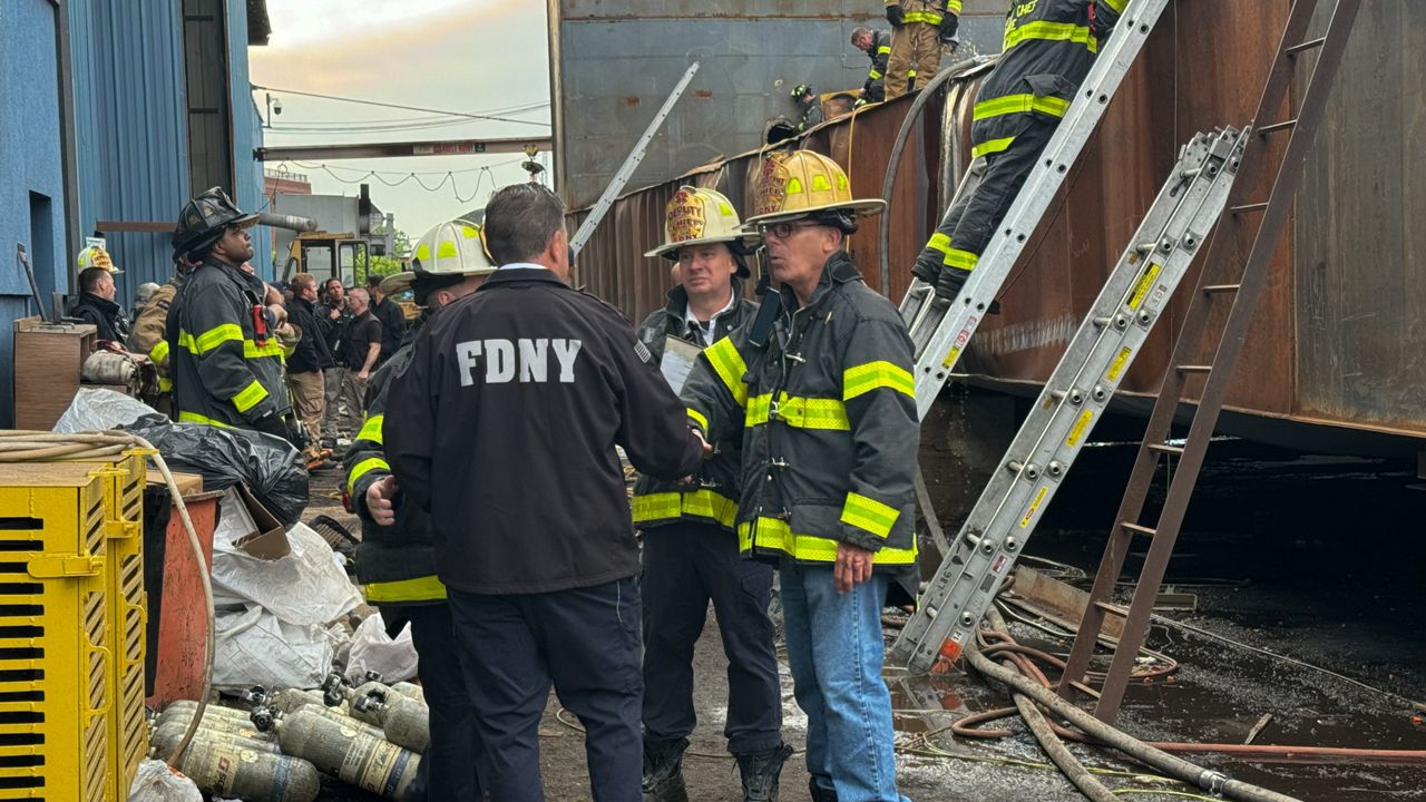 Firefighters respond to an explosion at a shipyard in Staten Island on Friday, May 22, 2026 in New York. (Staten Island Advance via AP)