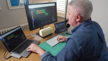 Musician Samuel Smith edits audio at his home, in London, Tuesday, May 12, 2026. 