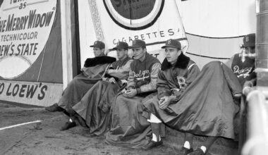 Members of the Brooklyn Dodgers watch the seventh and final game of the World Series against the New York Yankees from the bull pen at Ebbets Field in Brooklyn, New York, Oct. 7, 1952. From left to right are: Preacher Roe; Carl Erskine; Rube Walker and George Pfister. Player at extreme right is unidentified. The Yankees defeated the Dodgers, 4-2, winning the series 4 games to 3. Photo: Dick Strobel/AP