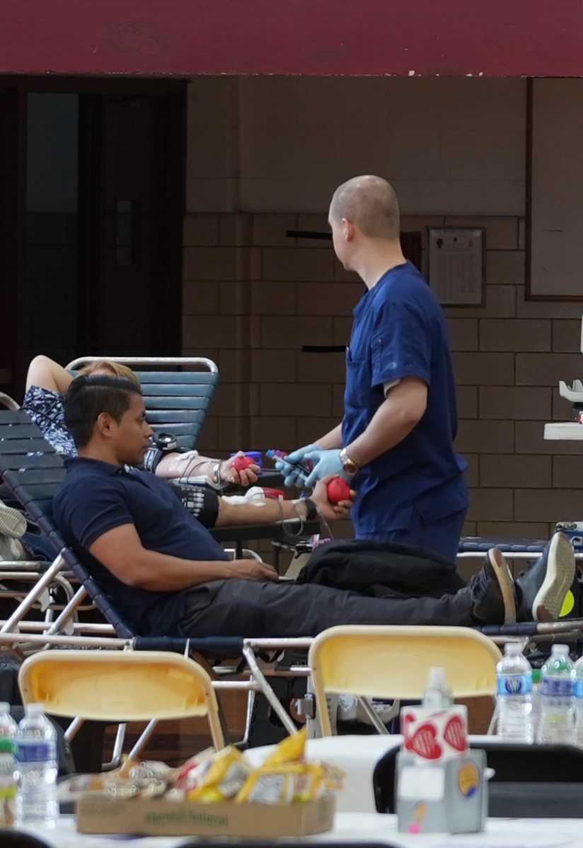 A student donating blood at Christ the King High School in Middle Village.
