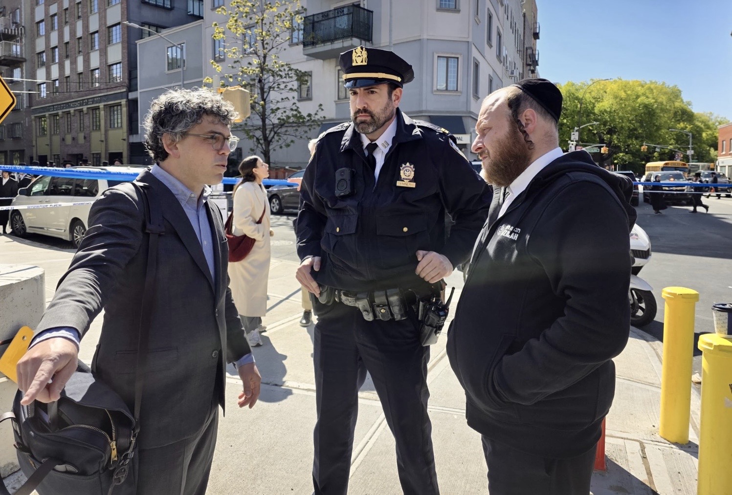 Councilmember Lincoln Restler, left, at the scene of Friday morning’s tragic accident in Williamsburg. Photo: Lincoln Restler’s Office
