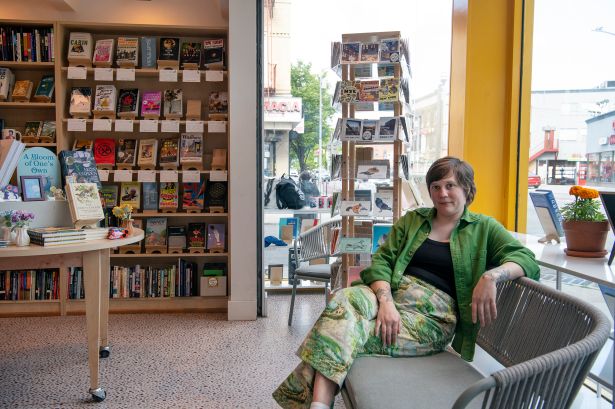 Lofty Pigeon Books co-owner Briana Parker sits inside the store in Brooklyn.