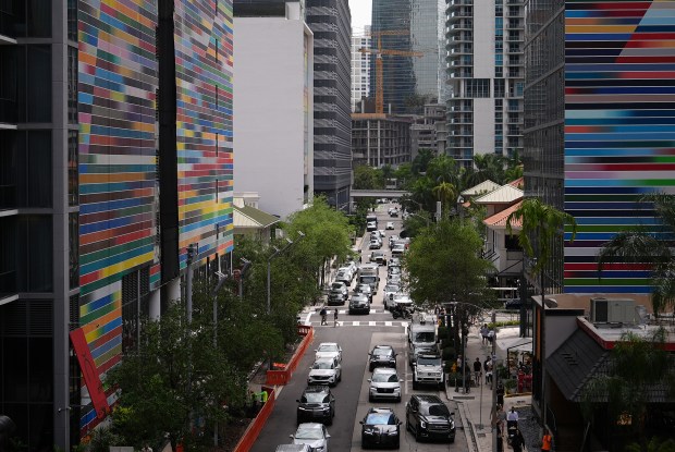 Cars drive through a commercial area, April 2, 2026, in the Brickell neighborhood of Miami. (Rebecca Blackwell/AP)