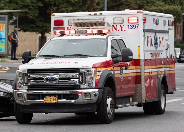 An FDNY ambulance parked outside.