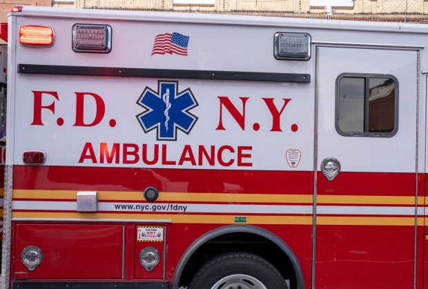 FDNY ambulance on the street during the day.