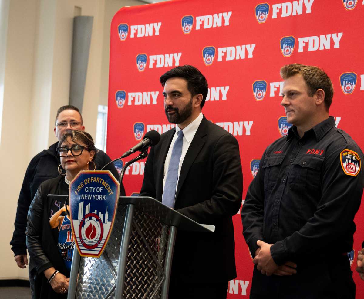 Mayor Mamdani thanked FDNY Firefighter Travis Langan (right) who saved prinicipal Carmen Pinto from a flooded car.