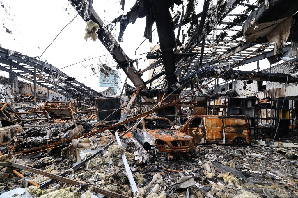 A photograph shows the damage at car service centre in eastern Tehran that was hit by a missile strike, on March 28, 2026.