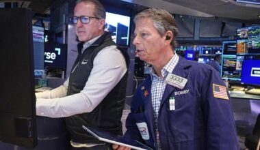 Wall Street catches up to gains made by world markets the day before