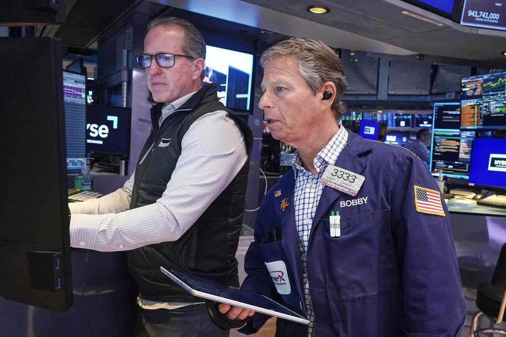 Wall Street catches up to gains made by world markets the day before