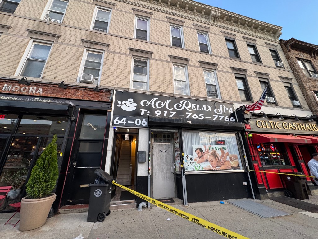 A yellow "Crime Scene - Do Not Cross" tape blocks the entrance of "AA Relax Spa" with a massage advertisement, next to a cafe and a pub.