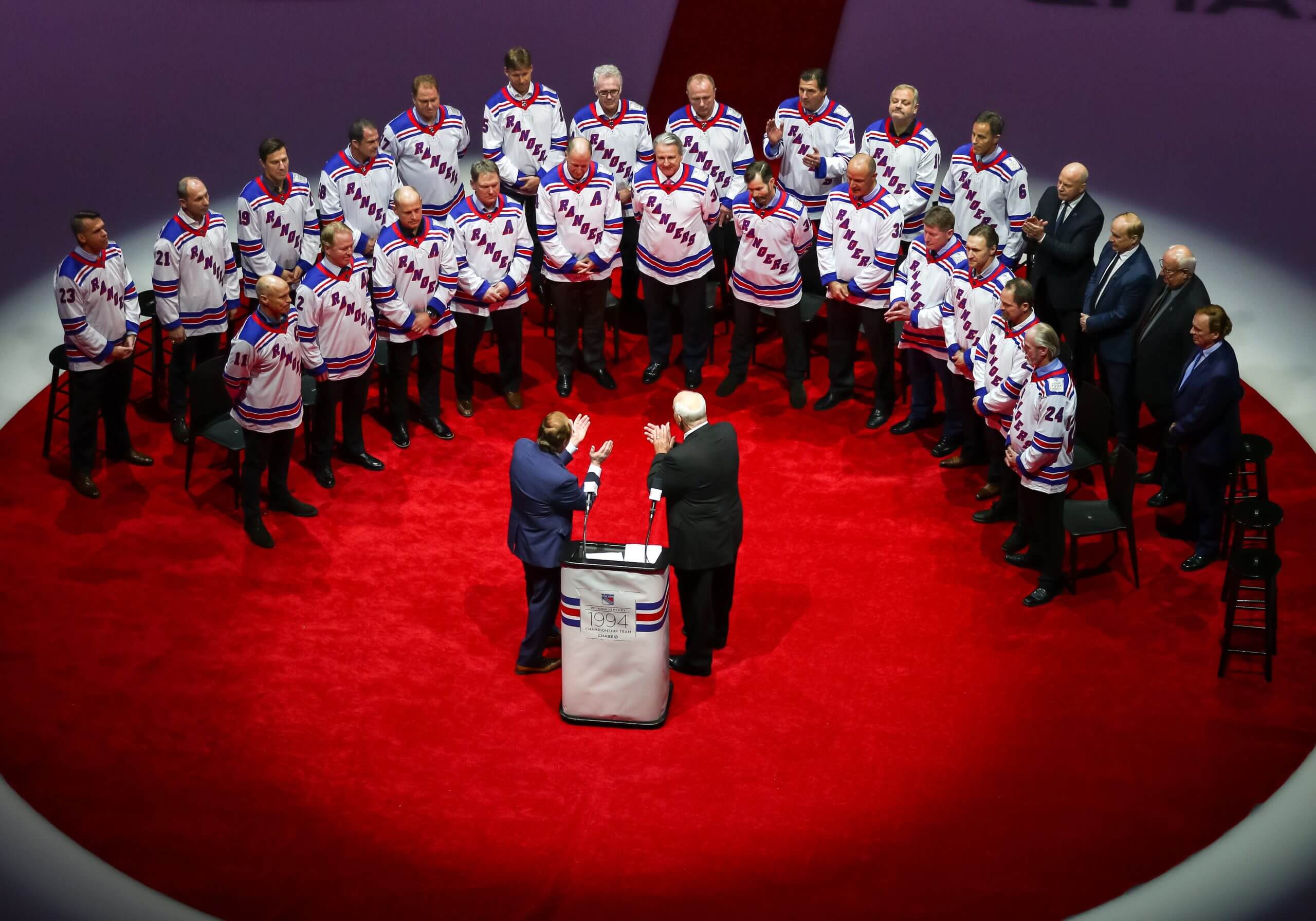 A wide shot of the 1993-94 Rangers reuniting for an on-ice ceremony before a Feb. 2019 game at Madison Square Garden.