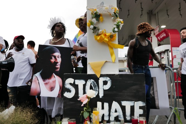 People gather at a memorial for O'Shae Sibley on Aug. 4, 2023, at the gas station where he was murdered in Brooklyn. (Photo by Spencer Platt/Getty Images)