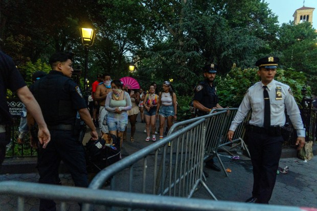 NYPD officers shut down Washington Square Park on June 29 2025. (Photo by MADISON SWART/Hans Lucas/AFP via Getty Images)