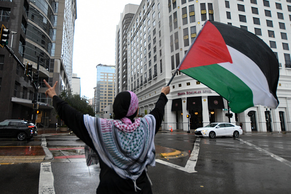 Pro-Palestine protesters demonstrate Pro-Palestine protesters demonstrate