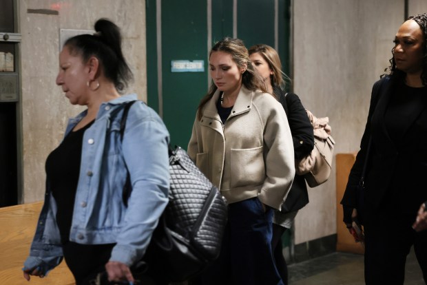 Former actress Jessica Mann (center) appears in Manhattan criminal court to testify against Harvey Weinstein on Thursday.