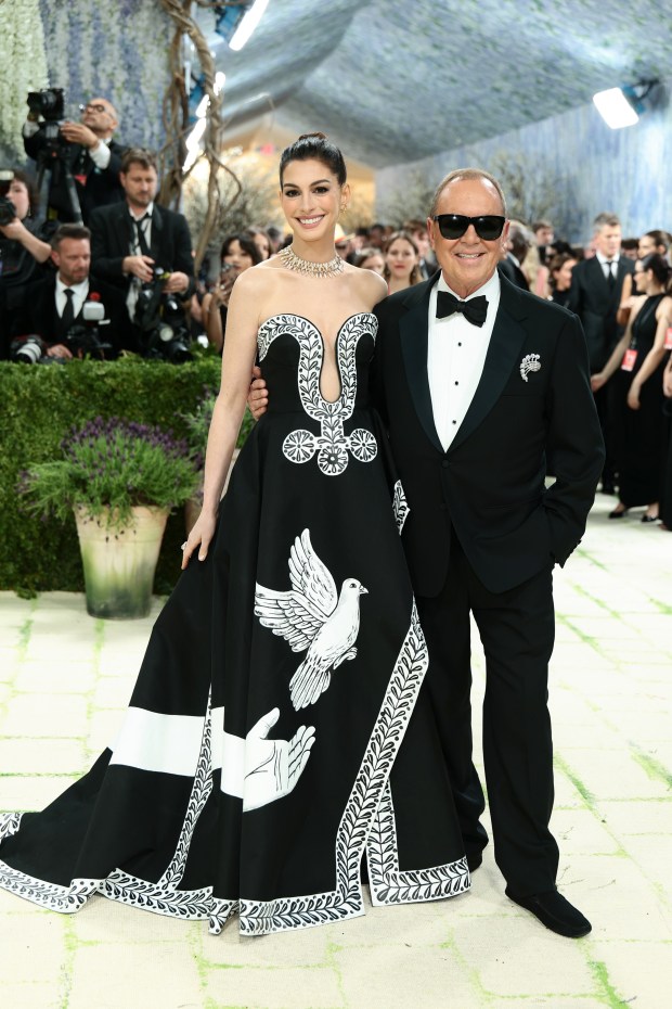 NEW YORK, NEW YORK - MAY 04: (L-R) Anne Hathaway and Michael Kors attend the 2026 Met Gala celebrating "Costume Art" at the Metropolitan Museum of Art on May 04, 2026 in New York City. (Photo by Dimitrios Kambouris/Getty Images for The Met Museum/Vogue)