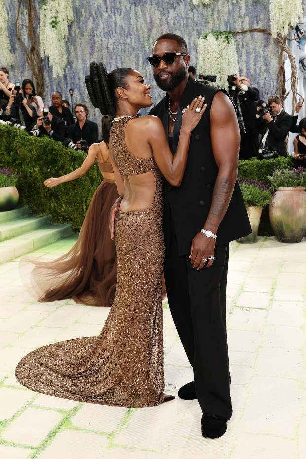 NEW YORK, NEW YORK - MAY 04: (L-R) Gabrielle Union-Wade and Dwyane Wade attend the 2026 Met Gala celebrating "Costume Art" at the Metropolitan Museum of Art on May 04, 2026 in New York City. (Photo by Mike Coppola/Getty Images)