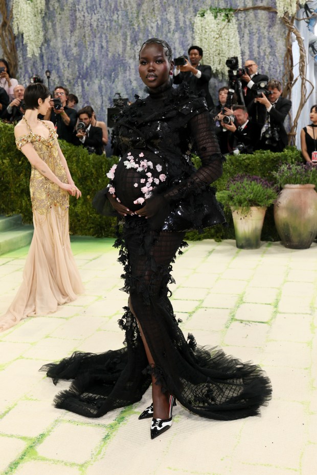 NEW YORK, NEW YORK - MAY 04: Adut Akech attends the 2026 Met Gala celebrating "Costume Art" at the Metropolitan Museum of Art on May 04, 2026 in New York City. (Photo by Mike Coppola/Getty Images)