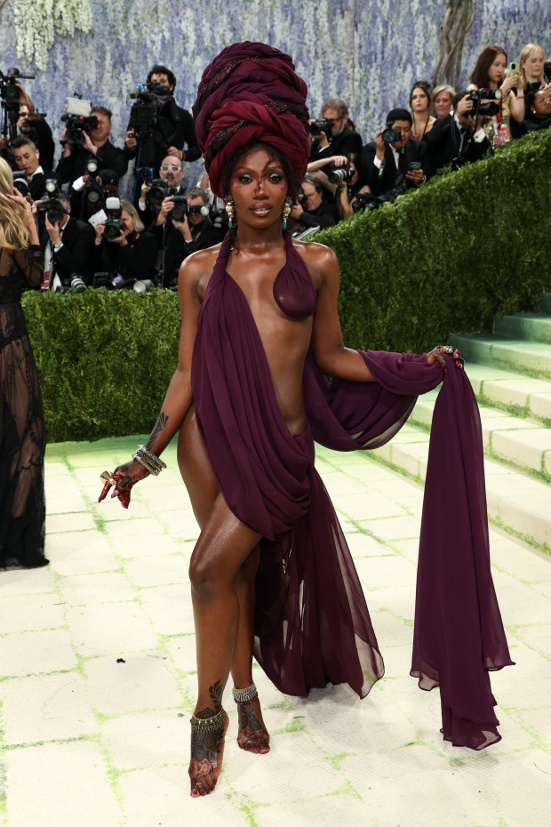 NEW YORK, NEW YORK - MAY 04: (EDITOR'S NOTE: Image contains nudity.) Docheii attends the 2026 Met Gala celebrating "Costume Art" at the Metropolitan Museum of Art on May 04, 2026 in New York City. (Photo by Jamie McCarthy/Getty Images)