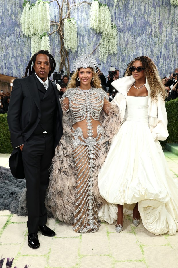 NEW YORK, NEW YORK - MAY 04: (L-R) Jay-Z, Beyoncé and Blue Ivy Carter attend the 2026 Met Gala celebrating "Costume Art" at the Metropolitan Museum of Art on May 04, 2026 in New York City. (Photo by Jamie McCarthy/Getty Images)