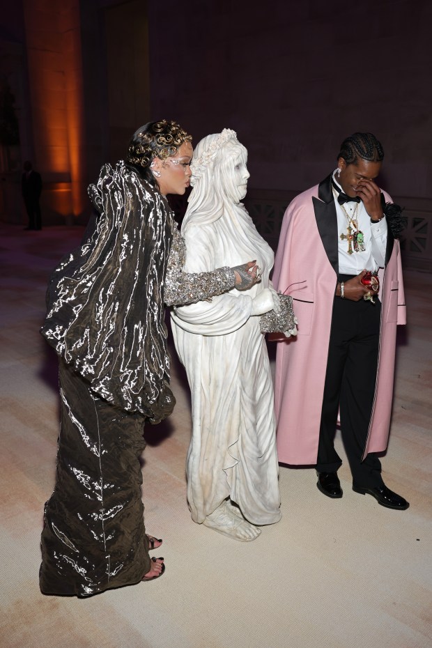 NEW YORK, NEW YORK - MAY 04: (L-R) Rihanna, Heidi Klum and A$AP Rocky attend the 2026 Met Gala celebrating "Costume Art" at the Metropolitan Museum of Art on May 04, 2026 in New York City. (Photo by Arturo Holmes/MG26/Getty Images for The Met Museum/Vogue)