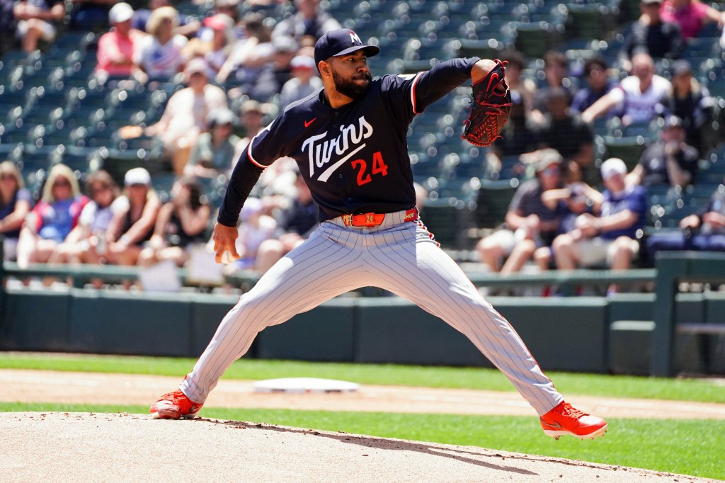 A Minnesota Twins pitcher delivers a pitch.