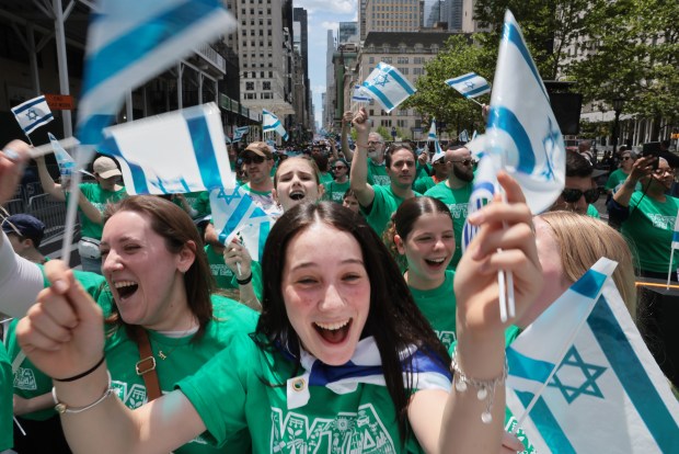NEW YORK, NEW YORK - MAY 31: Thousands of Jewish and Israeli Americans participate in the annual Israeli Day Parade, the world's largest pro-Israel parade, on May 31, 2026, in New York City. This year's event takes place under heightened security with hundreds of police, K-9 units, and undercover officers patrolling the route up 5th Avenue. New York City mayor Zohran Mamdani did not attend the parade, the first mayor in recent history not to do so. (Photo by Spencer Platt/Getty Images)