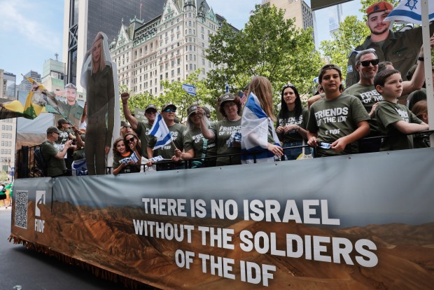NEW YORK, NEW YORK - MAY 31: Thousands of Jewish and Israeli Americans participate in the annual Israeli Day Parade, the world's largest pro-Israel parade, on May 31, 2026, in New York City. This year's event takes place under heightened security with hundreds of police, K-9 units, and undercover officers patrolling the route up 5th Avenue. New York City mayor Zohran Mamdani did not attend the parade, the first mayor in recent history not to do so. (Photo by Spencer Platt/Getty Images)